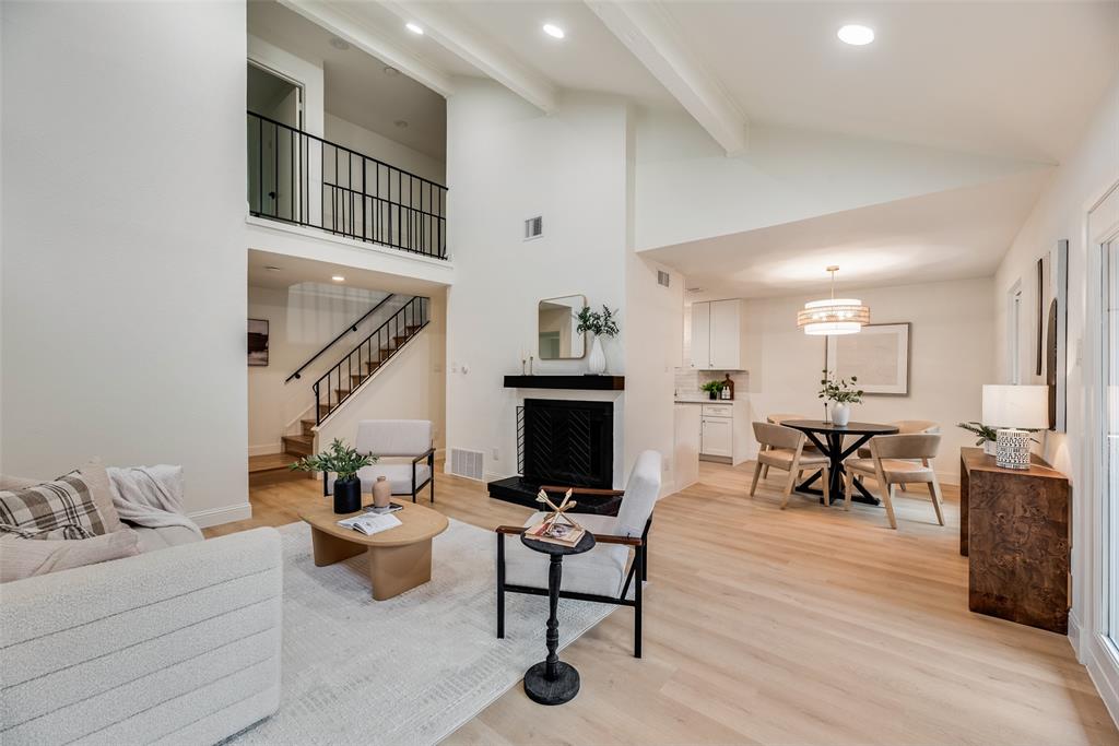 Experience the perfect blend of contemporary luxury and urban convenience in this stunning, fully renovated condo. Boasting a chic, airy aesthetic, this home features high-end finishes throughout and an open-concept layout designed for modern living.The light-filled living area is anchored by a dramatic fireplace and soaring ceilings, creating an inviting space for both relaxation and entertaining. The chef-inspired kitchen and updated bathrooms reflect a meticulous attention to detail, while the spacious primary suite offers a private retreat with ample storage and a sleek ensuite bath.Located in a prime Dallas pocket, you are just steps away from the scenic trails, kayaking, and sunsets of White Rock Lake. Enjoy the low-maintenance lifestyle with access to a sparkling community pool and the best outdoor recreation the city has to offer.