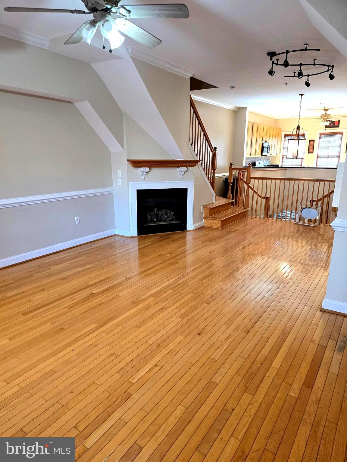 Far from ordinary, this  exceptional , recently built, Federal style townhouse is situated in the Fells Point Historic District. The Fell family would have been more than proud to call this their home if it were available in their time period.  This townhouse is updated to the standards of the 21 century. It includes all the ambiance of the Colonial Era, yet features all the benefits of today. 2 primary bedrooms with their own bathrooms, an open concept living area with tall ceilings, 2 strategically located balconies and a rooftop deck. The floors in the upper levels are hardwood oak.  The open living area is graced with a gas log fireplace.  A 1 car attached garage is included, so unlike yesteryear you no longer need to house the horse and carriage in the Livery Stable across the Street.  A credit score of  700 or better is desired. No smokers please. This house is situated in the Fells Point Historic District and located just a block or so from Baltimore's newest waterfront communities.  Harbor Point and Harbor East.