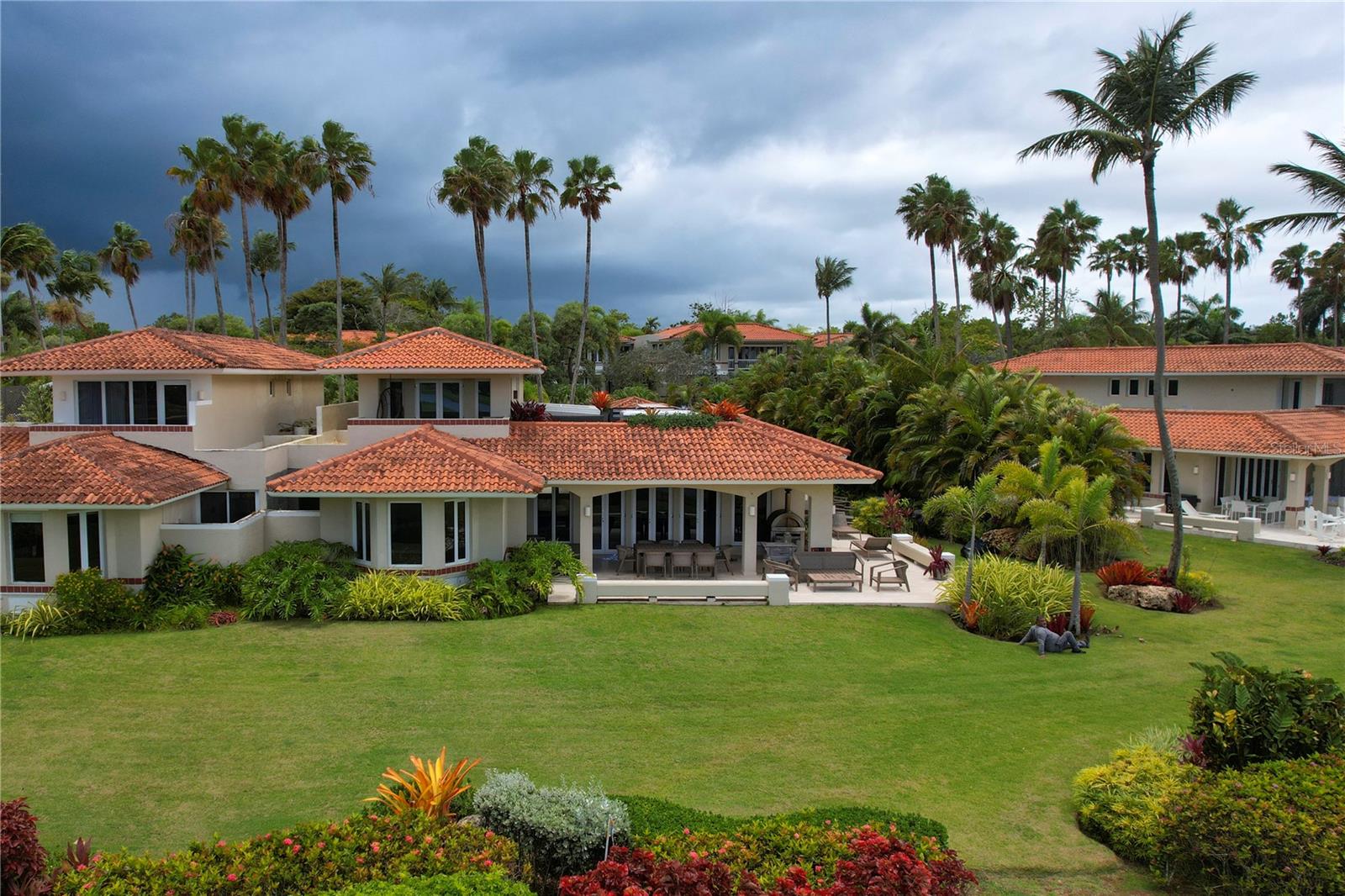 Beautiful villa for sale located in The Greens Villa within the Dorado Beach Resort. This elegant property features 4 spacious bedrooms and 4.5 bathrooms, offering comfort, privacy, and ample space for residents and guests.The home offers approximately 4,000 square feet of interior living space, complemented by an impressive 2,100 square feet of covered terraces designed for outdoor living and entertaining. These terraces provide panoramic views of the golf course and the lake, creating a serene and picturesque setting. The property also includes a 600-square-foot garage with space for up to 4 vehicles.This villa is professionally decorated and will be sold fully furnished, allowing the new owner to move in and immediately enjoy the refined lifestyle the community offers. The home also features central air conditioning throughout and a private jacuzzi, perfect for relaxation.Ideally situated near to the beach, the property enjoys beautiful lake and golf course views, combining luxury, comfort, and the natural beauty of Dorado Beach Resort. This is a rare opportunity to own a stunning residence in one of Puerto Rico’s most exclusive resort communities.