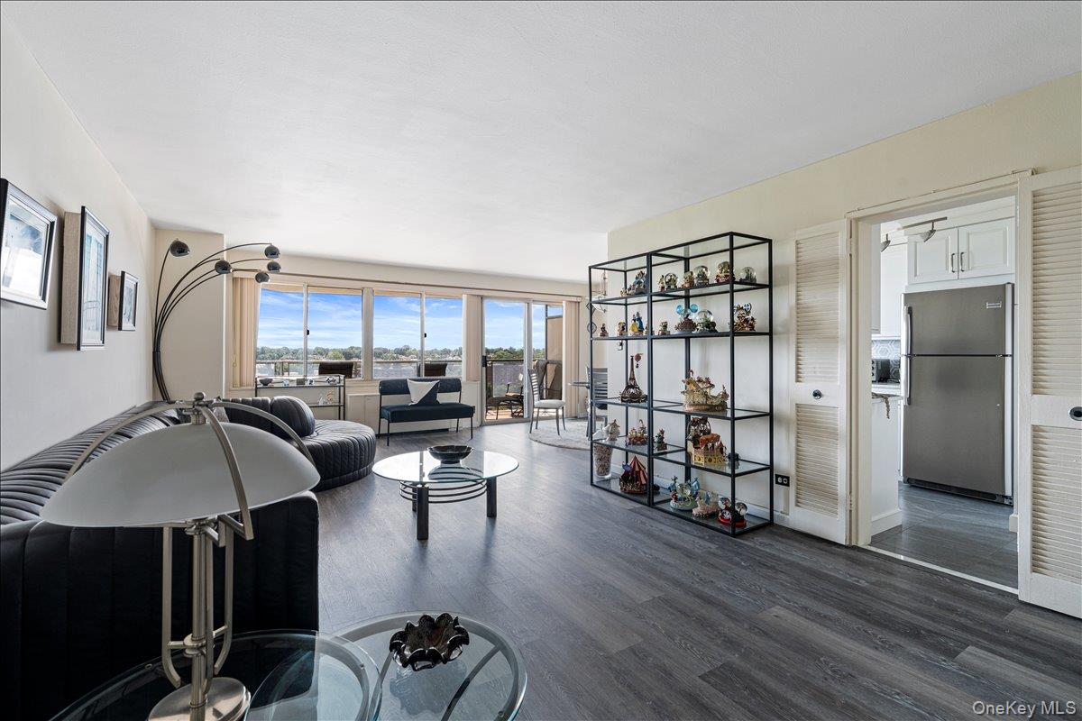 Welcome to waterfront luxury living in the highly sought-after Towers at Waters Edge!This beautiful three-bedroom, two-full-bath corner residence offers spacious interiors, unobstructed breathtaking views, and resort-style amenities. Upon entering, you are greeted by a generously sized L-shaped living and dining room, new vinyl plank flooring that is perfect touch for both everyday living and entertaining.The beautifully designed walk-through kitchen features stainless-steel appliances and plenty of space for preparing your favorite meals. Step outside onto the oversized balcony and take in the incredible panoramic views of Little Neck Bay, an ideal setting for dining al fresco, enjoying your morning coffee, or simply unwinding after a long day.Each bedroom is comfortably sized, while the primary suite provides a private retreat feel, complete with a newly renovated bathroom and its own private balcony. Best of all, every room showcases a spectacular water view!The Towers at Waters Edge offers an exceptional lifestyle with a 24-hour doorman and security, pool club, tennis and racquetball courts, playground, state-of-the-art fitness center, and so much more.This is luxury living at its finest and an opportunity you will not want to miss. Schedule your private showing today!