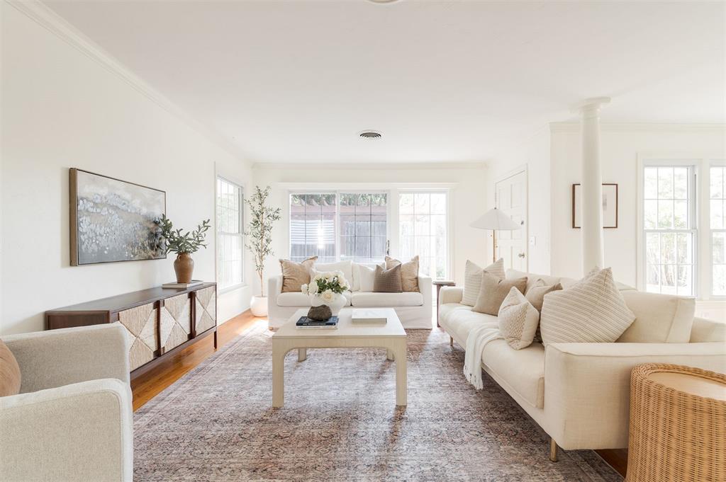 Effortlessly livable Nichols Hills ranch. The white-painted brick brings a clean, modern edge to its classic lines, and Inside, the open kitchen keeps everyone connected to the large living room, while a separate sitting room with a fireplace gives you a quieter space to slow down. With three bedrooms, two full baths, and an easy single-level layout, it’s the kind of home that feels comfortable the moment you step inside. Multiple doors open to a quaint backyard with a sunny deck and a small basketball goal— the perfect mix of relaxation and play. Just blocks from Christ the King and surrounded by the quiet streets of Nichols Hills Proper, this home is equal parts character and comfort.