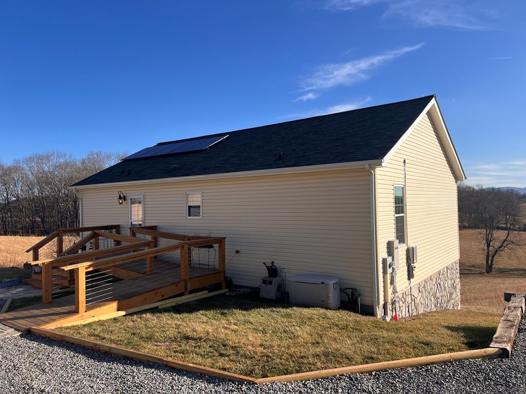 This is a move in ready home that does not need any updates. The dwelling features 3 bedrooms and 2 full bathrooms with layered mountain views. The subject site consist of 10.57 rolling to almost level acres which is 60% open to 40% wooded. The subject has a walk out partial finished basement that has a family area, bedroom and is plumed for a half bathroom. The house has a whole house generator, solar panels,  and detached dirt floor detached garage. This property has it all.