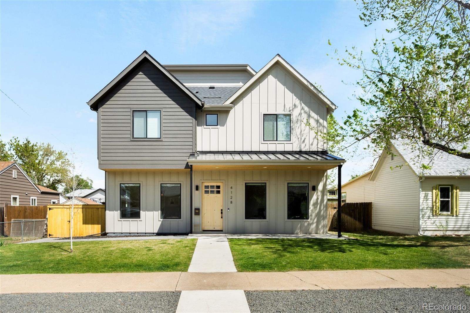 Sophisticated modern living just blocks from Tennyson and minutes to Downtown! Soaring 10’ ceilings on the main level and 9’ ceilings above create a grand sense of space, while exposed metal beams and a striking monolithic staircase deliver architectural impact.  Designed for seamless entertaining, the elegant scullery features a dual-zone wine fridge, additional sink, and walk-in pantry. The oversized primary suite is a private retreat, complete with a spa-inspired bath and sleek curbless shower. Seamless indoor-outdoor living extends to a private yard and an expansive rooftop retreat—perfect for relaxing or hosting under the Colorado sky. The third-floor penthouse elevates the experience even further, offering a stylish gathering space with a wet bar, mini fridge, and half bath—ideal for movie nights, game days, or sophisticated entertaining. Set your showing today!