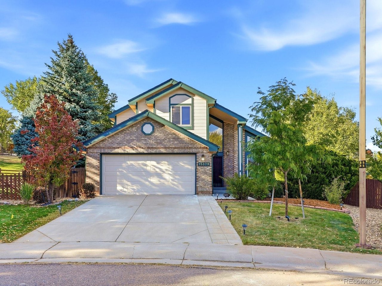 Tucked away in a quiet cul-de-sac, 15379 Periwinkle Court offers an incredible blend of space, style, and a prime location in the heart of Stonegate. This home has been thoughtfully refreshed with a crisp palette of new interior paint and plush new carpet on the main floor and upstairs, making it feel bright, open, and completely move-in ready from the moment you step through the front door.The main level is designed for both productivity and relaxation.  A dedicated offices provides the perfect quiet spot for remote work, while two sitting areas offer plenty of room to spread out - whether you're hosting guests in a formal setting or curled up in a more casual spot.  The heart of the home is the eati-in kitchen, which flows naturally into the living spaces and serves as a central hub for daily life.The layout is a rare find, four bedrooms and five bathrooms, including two distinct primary suites.  Having one on the main floor offers flexibility and functionality, while the second suite upstairs provides a private retreat.Outside, the property truly shines.  The backyard directly borders a beautiful park, offering wonderful views and easy access to open space right at your doorstep.  The location within the community is hard to beat - you're just a short walk away from the neighborhood school and only minutes from the signature pools, trails and amenities that make Stonegate so popular.  Come and make this home your next chapter.