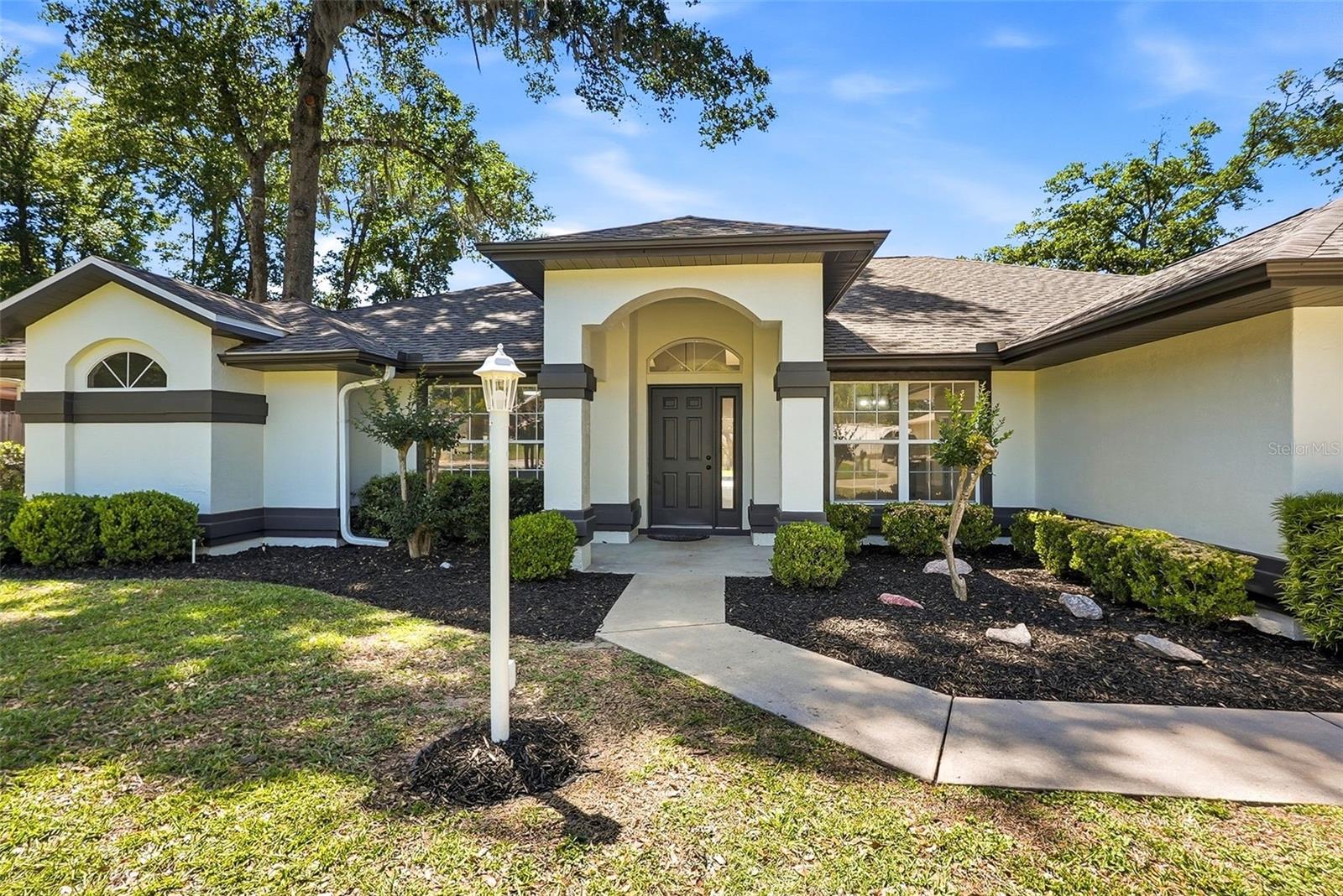 Welcome to this beautifully remodeled home in the heart of Ocala, where modern upgrades meet everyday comfort. This move-in ready 4-bedroom, 2-bath property with a 2-car garage has been thoughtfully updated throughout, offering a fresh, contemporary feel with quality finishes. No HOAStep inside to a bright, open living space featuring new flooring, updated lighting, and a functional layout ideal for both relaxing and entertaining. The kitchen has been fully renovated with new cabinetry, sleek counter tops, and updated appliances, creating a stylish and practical centerpiece of the home.Both bathrooms have been upgraded with modern fixtures and finishes, while the bedrooms give comfortable, well-lit spaces with ample storage.Recent improvements include a new roof and H VAC system, providing added value and peace of mind.Outside, enjoy a spacious yard with room to personalize, perfect for outdoor living, pets, or future additions.Conveniently located near shopping, dining, schools, and major roadways, this property is ideal for homeowners or investors seeking a turnkey opportunity in a desirable Ocala location.