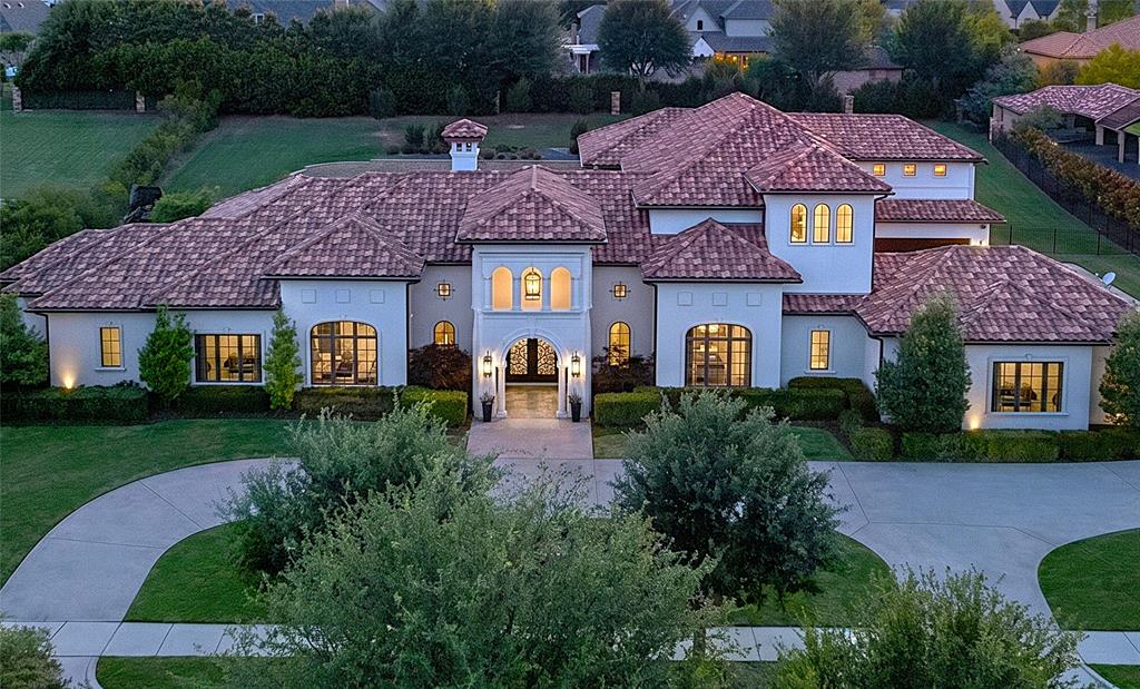 A rare opportunity to own a magnificent Santa Barbara-inspired Mediterranean estate nestled within the exclusive gated community of Estates of Craig Ranch. Reminiscent of the finest California coastal estates, poised on over an acre, this estate delivers a lifestyle unlike any other - including a one-time transferable TPC Craig Ranch golf membership valued at $150K, allowing the new owner to completely bypass the coveted waitlist and step directly into premier golf living.At 7,271 sq ft, the floor plan is exceptional and increasingly hard to find: 3 bedrooms down, 2 up - one with a generous sitting room, spread across 4 expansive living areas including a first floor theater, designed for both grand entertaining and comfortable everyday living. Three custom iron doors in the main living room dissolve the boundary between indoors and out, opening seamlessly to multiple sprawling main floor verandas, resort-style pool and the expansive outdoor living center-kitchen-grill area. Directly above, a second large balcony overlooks the same breathtaking setting, delivering a true indoor-outdoor experience on both levels. A dedicated media theater off the family room, a hidden extra large additional flex space-gym, an oversized walk-in pantry, and a reinforced hidden safe room round out a home as thoughtfully functional as it is stunning.The primary suite is a true sanctuary with his and hers oversized closets, dual commodes, a steam shower, and a freestanding soaking tub. The 4-car garage features EV charging stations with additional guest parking. The sprawling acre-plus lot leaves room for a future tennis or sport court. A lifestyle of luxury, privacy, and unrivaled golf living, effortlessly delivered.