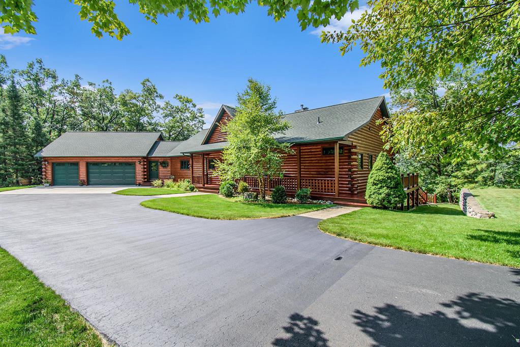 A Northern Michigan Escape Like No Other
Follow the winding drive through the trees and you'll find your private paradise on Long Lake. This 10.62-acre estate blends comfort, style, and recreation in one incredible package. The 4,568 sq ft luxury home features 5 bedrooms, 2 full and 2 half baths, soaring cathedral ceilings, and a grand stone fireplace. The kitchen, dining, and sitting areas are made for gathering, while the primary suite offers a quiet retreat with dual walk-in closets and beautiful bathroom. A walkout basement adds a workout room and extra living space.
Step outside to a sprawling deck overlooking 250+ feet of crystal-clear lake frontage. On the grounds, you'll find a 2,200 sq ft pole barn with man cave, a guesthouse/playhouse, basketball court, batting cages, and a dock ready for summer fun.
Long Lake is a nearly 300-acre all-sports lake, perfect for fishing, swimming, and boating, with depths reaching 90 feet. State land adjacent makes for excellent hunting, hiking, and trail riding are right out your back door.
Whether it's your forever home, a weekend retreat, or the ultimate lake house, this property delivers the full experience.