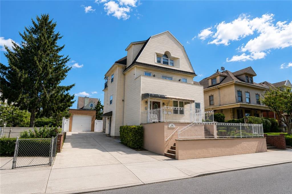 Prime Bay Ridge - Fully Detached 2 Family on a 50 x 100 Lot. Home is 25 x 50, 3,250 living sq. ft., with a wide private driveway and an extra-large detached garage that can house a Winnebago.   Large peaceful backyard.  Home has lots of closets, beautiful hardwood floors, a fully finished basement, a large front balcony + 2 full-sized floors for the 1st family.   The second family has generous-sized rooms & 2 beautiful bedrooms & a back balcony.    A MUST SEE!!!!!