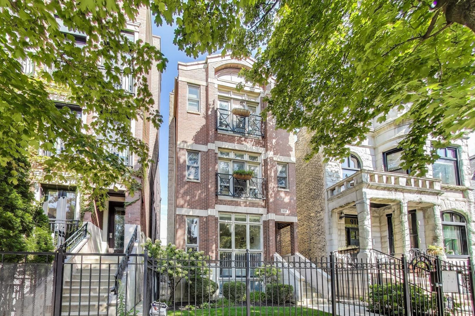 Welcome home to this bright and sunny 3-bedroom, 2.5-bathroom duplex down condo, located on the tree-lined Wrightwood Avenue in the highly sought-after Alcott School District.  This home features two floors of living space and two private decks.    The main level greets you with an open, freshly updated living space featuring a white kitchen, a cozy gas fireplace, massive floor to ceiling south facing windows with automatic shades, and rich hardwood flooring throughout. The living room flows seamlessly into a separate dining area and the refreshed kitchen, complete with white cabinetry, granite countertops, stainless steel appliances and a breakfast bar for additional seating.    On this level, you will also find the primary suite with a custom organized walk-in closet and luxurious ensuite bathroom containing a large shower with a custom glass door, separate whirlpool tub, dual vanities and linen storage.  Rounding out the first floor is a half bath and access to the private outdoor space containing a back deck that is perfect for relaxing in the shade, grilling and outdoor dining.  Or bask in the sun on the private garage roof terrace complete with a custom-built wood pergola.    The lower level offers a second living space with high ceilings, southern exposure brightness, surround sound speakers, second gas fireplace and a wet bar with a beverage cooler.  A perfect room to watch movies and sports or simply relax by the warm fire on a winter day. This level also includes two bedrooms with custom built-in closets, a second full bathroom, the laundry room and tons of storage space.    This home comes with one garage parking spot and additional storage.  Prime Lincoln Park location with a 95 Walk Score!  Steps to Trader Joes, Fresh Market, a variety of restaurants, parks, shops and public transit options (Brown, Purple and Red Line Trains / Diversey and Halsted Bus).    With a single-family home feel in an incredible location, this home is a must see!
