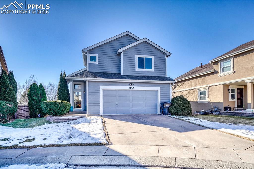 Exceptional home on a desirable cul-de-sac in a quiet, welcoming neighborhood with convenient access to shopping, dining, medical facilities, and all major military bases. The open main-level floor plan offers great flow between the living room, dining area, and kitchen—ideal for everyday living and entertaining.Vaulted ceilings and tall windows fill the home with natural light. Upstairs features three bedrooms, including a spacious primary suite with walk-in closets, while the lower level includes a fourth bedroom, 3.5 baths total, and a walk-out to the backyard. Enjoy morning coffee or evening sunsets from the back deck, plus easy access to nearby trails for walking, running, or biking. Located in School District 49.