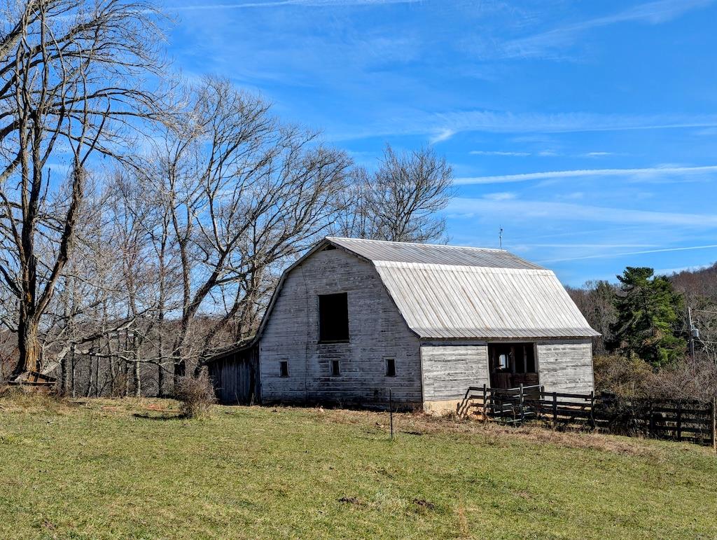 Just over 25 acres of well fenced pasture and beautiful country views in the heart of Willis VA. This property has recently been upgraded with new interior cross fencing, electricity, well and 3 water boxes. The large barn offers a lot of opportunities depending on your farming or non farming desires. Located on state maintained primary road with plenty of frontage. Build your home on the ridge overlooking your farmstead operation! Easy commute to Floyd, Hillsville, Radford & Christiansburg VA.