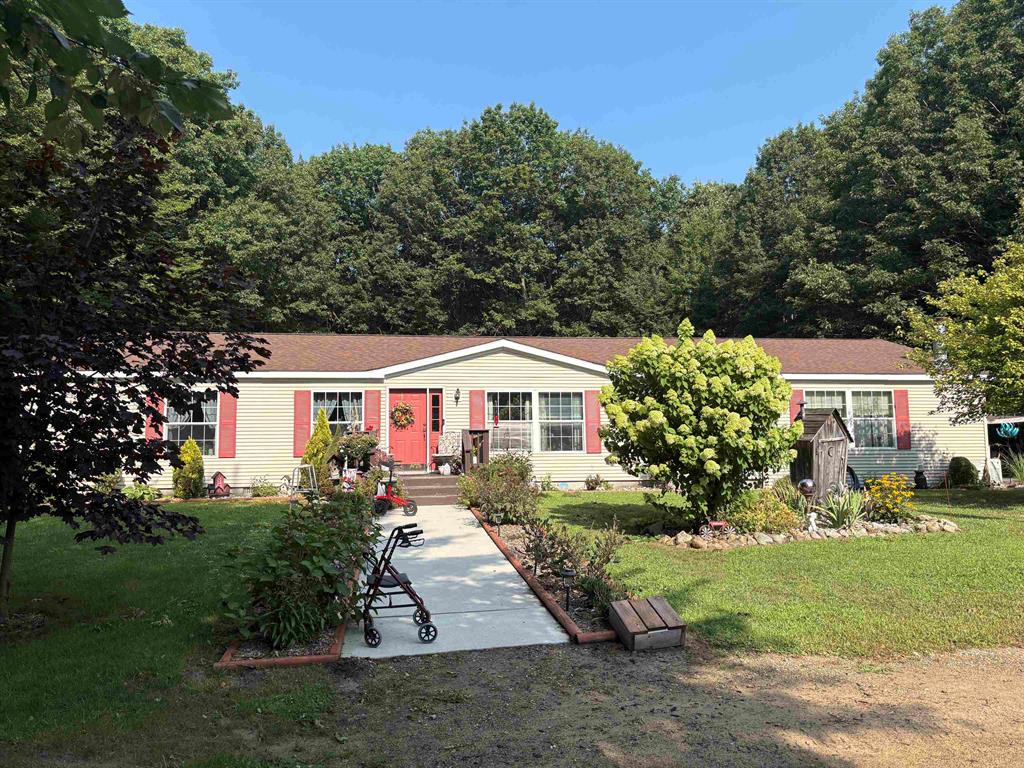 If you love nature and privacy, look no further than this 2356 sq ft home nestled over 1000 feet off the road on 37.5 wooded acres. This 3-bedroom 2 bath home has custom kitchen, living room and family room with a fireplace. The master suite includes 8x14 walk in closet, large private bath and 8x14 sitting room. 24x32 garage with lean to and 24x40 pole barn for your toys. Plenty of wildlife to enjoy!