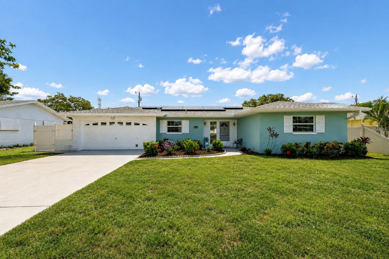 Welcome home to this beautifully maintained 3-bedroom, 2-bath, 2-car garage home in Clearwater, Florida, offering the perfect combination of modern updates, energy efficiency, and an unbeatable location. Whether you're a first-time homebuyer, downsizing, or looking for a move-in-ready Florida home, this property checks every box.Inside, you'll find a bright, open floor plan with comfortable living spaces and a kitchen featuring newer stainless-steel appliances, making everyday living and entertaining effortless. The spacious 2-car garage provides plenty of room for vehicles, storage, or a workshop.Step outside into your private backyard oasis featuring a fully vinyl-fenced yard, an expansive paver patio, a new retractable awning, and two storage sheds—perfect for entertaining, gardening, pets, or simply enjoying the Florida sunshine.This home is designed to save you money with energy-efficient solar panels, helping reduce monthly electric bills. Additional updates include a new roof (2023) and fresh exterior paint, giving buyers peace of mind for years to come.One of this home's biggest advantages is its exceptional location. Situated in a non-flood zone and non-evacuation zone, you'll enjoy added security while still being just minutes from everything that makes Clearwater one of Florida's most desirable places to live. Outdoor enthusiasts will love the direct neighborhood access to the Duke Energy Trail that connect to the Pinellas Trail, making it simple to explore all that Pinellas County has to offer.Conveniently located near Clearwater Beach, Downtown Dunedin, Safety Harbor, Largo, Tampa International Airport, St. Pete-Clearwater International Airport, top-rated shopping, restaurants, medical facilities, parks, and major highways, this home offers the ideal Florida lifestyle with easy access to work, recreation, and the Gulf Coast.