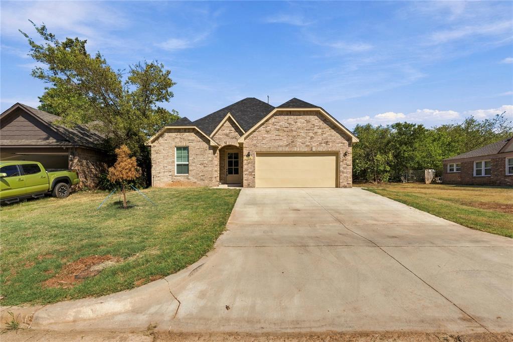 Welcome to 2136 N Everest Ave, a thoughtfully designed 1,692 sq ft new construction home in the heart of Oklahoma City. This home offers the opportunity to enjoy modern comfort in one of OKC’s most convenient locations. Step inside to find a bright and open floor plan with tall ceilings, large windows, and a cozy fireplace with a custom wood mantle. The spacious living area flows seamlessly into the kitchen and dining, creating the perfect space for both everyday living and entertaining. This home features 3 bedrooms and 2 bathrooms, including a split floor plan for optimal privacy. With modern finishes throughout and energy-efficient construction, you’ll enjoy both style and peace of mind. Outside, the covered entry and brick exterior add timeless curb appeal, while the backyard provides room to create your ideal outdoor retreat. Whether you are looking to be near the action of the city or enjoy a brand-new home with low maintenance, this property offers the best of both worlds! Schedule your showing today!