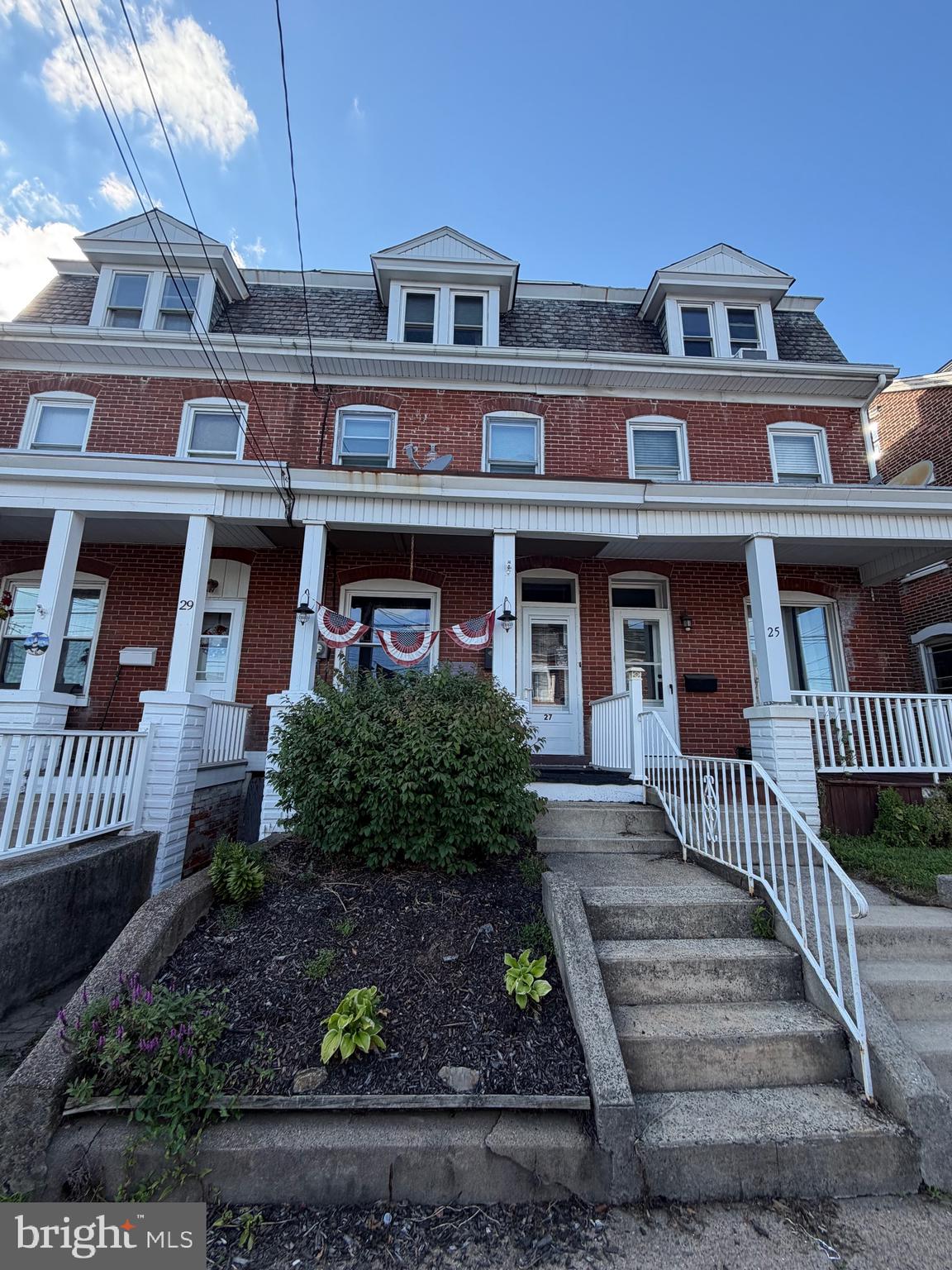 Charming three story brick row home features seperate living and dining rooms, and large eat-in kitchen on first floor. The welcoming front porch is a great place to enjoy an evening at home and the full basement offers plenty of extra storage space. Four spacious bedrooms on the second floor and spacious third floor features a bonus room. Many great upgrades completed in this home, newer roof, newer  floors and newer windows.