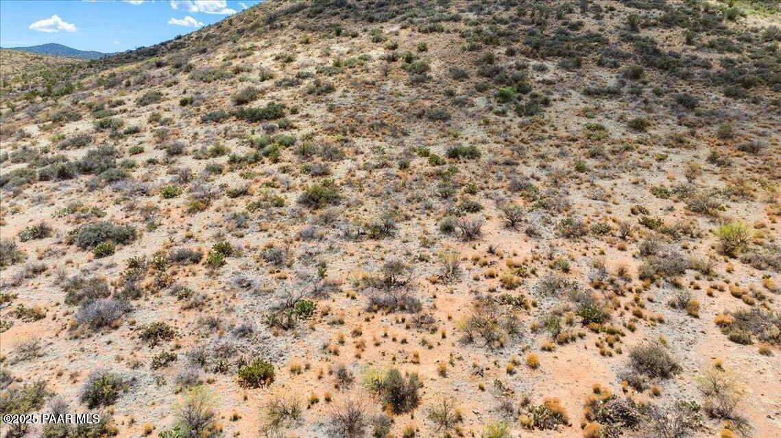 Discover 40.01 acres of pristine beauty in the heart of the tranquil Ruger Ranch community in Kirkland, AZ. This expansive parcel offers panoramic views that stretch for miles, capturing the natural majesty of the surrounding high desert landscape. Whether you're envisioning a private retreat, a custom dream home, or simply a peaceful escape from the hustle of city life, this property offers endless potential. Enjoy the unmatched serenity, star-filled nights, and wide-open skies of rural living--all within reach of modern conveniences. Rarely do opportunities like this come along--your slice of Arizona paradise awaits in Ruger Ranch.