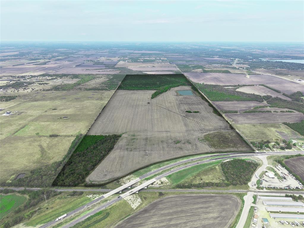 Located along the highly traveled US Highway 380 corridor in Greenville, Texas, this exceptional development opportunity offers approximately ±1,800 feet of frontage and outstanding visibility in one of Hunt County's fastest-growing areas. The property is situated within the City of Greenville ETJ and is currently unzoned, providing flexibility for a variety of potential uses including residential development, investment, or future mixed-use opportunities.The site benefits from strong traffic counts with approximately 13,895 vehicles per day along US Highway 380 and 17,601 vehicles per day along US Highway 69, offering excellent accessibility and exposure. The property is located within Greenville ISD and has access to City of Greenville utilities, making it well-positioned for future development as growth continues to expand east of the Dallas-Fort Worth Metroplex.