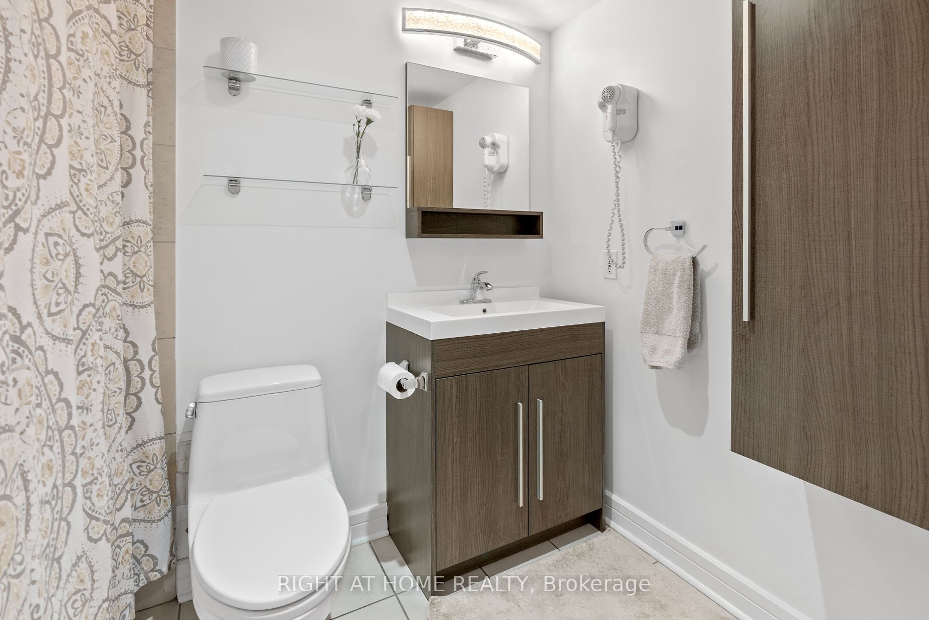 16 Harrison Garden Blvd 209