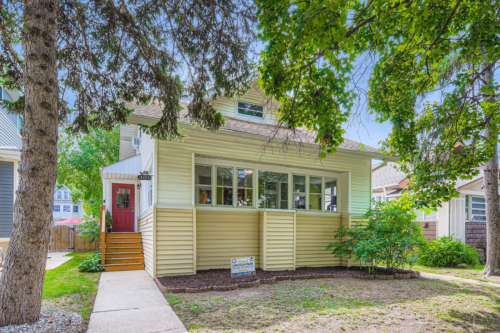 Classic vintage woodwork meets fresh quartz in this Portage Park beauty! This home with a deceptively large floorplan on a large 40' wide lot has so much to offer. Upon entering you'll see the open floorplan living room, dining room, and kitchen with its beautiful finishes and expansive breakfast bar. The main level also has a bedroom, and back breakfast nook, a full width enclosed front porch, and a back porch / mud room to boot (pun intended). The upper level features 3 bedrooms and a huge adjoining dressing room off the primary bedroom. The unfinished basement is a blank slate with plenty of space to expand as needed, comfortable head clearance, storage and laundry, and also featuring a new steel I-beam from when the sellers purchased this home. The back yard boasts plenty of space for little legs and big legs to stretch out and get some exercise with a huge deck built within the past few years as well as low-maintenance artificial turf. Then Portage Park with its community pool, new pickleball courts, and a plethora of green space is only a few blocks to the west while smaller Dickinson Park a few blocks to east is another great option to mix with the neighbors. The home is also a short distance to restaurants such as Moonflower, Community Tavern, Sutherlands, and so much more as well as being conveniently located about a 5min drive to interstate 90/94 and near grocery options. Please come see this!