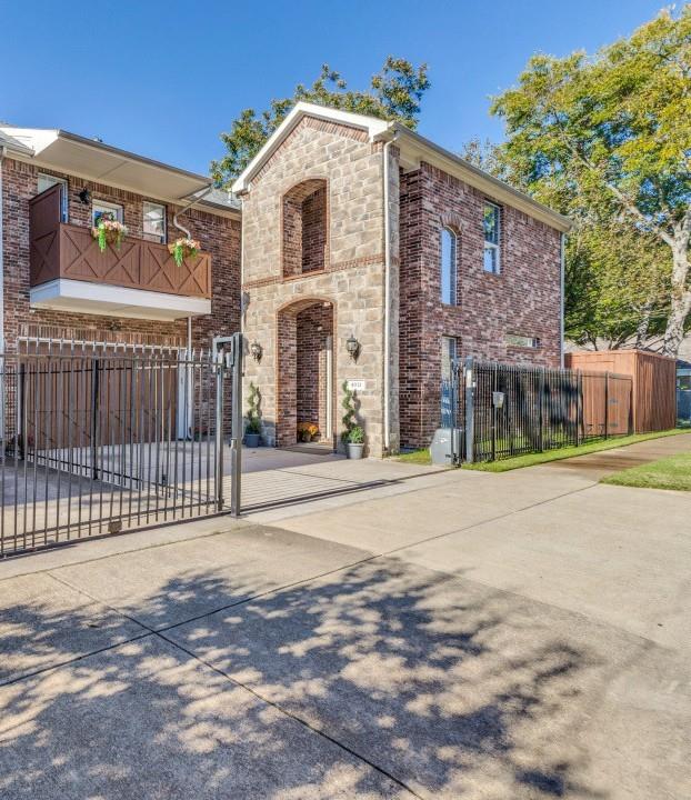 See Virtual Tour! Welcome to 4931 Homer Street — a secure, move-in-ready gem in the heart of Dallas Midtown, just steps from the vibrant Knox-Henderson corridor. This well-designed floor plan includes three bedrooms, an office or optional fourth bedroom, and three full bathrooms arranged across two convenient levels. The upper-level primary suite offers approximately 400 square feet with a raised ceiling, jetted tub, separate shower, and a divided walk-in closet with direct access to the laundry room. A private balcony provides neighborhood views.Recent updates totaling over $50,000 include a new air-conditioning unit and hot water heater. The kitchen and baths feature quartz countertops, modern fixtures, glass-door showers, upgraded toilets, stainless steel appliances, a new disposal, and an instant hot-cold water dispenser.The lower level includes a guest bedroom with ensuite closet and full bath. The entryway opens to a living area with wood floors, a gas fireplace, and large windows providing abundant natural light. Location is everything here. Outdoor features include a spacious patio with outdoor carpeting and two side yard areas suitable for pets, entertaining, or gardening. Additional highlights include an upstairs sitting area, generous closet storage, and a security system with cameras and full fencing.Location is everything here. Nestled in desirable Midtown, you're moments from Knox-Henderson's renowned shopping, dining, and entertainment scene — think trendy restaurants, boutique shops, coffee houses, and lively nightlife. Enjoy easy access to the Katy Trail, downtown Dallas, and major highways, all while living in a quiet, tree-lined corner setting at Homer and Lee Streets.