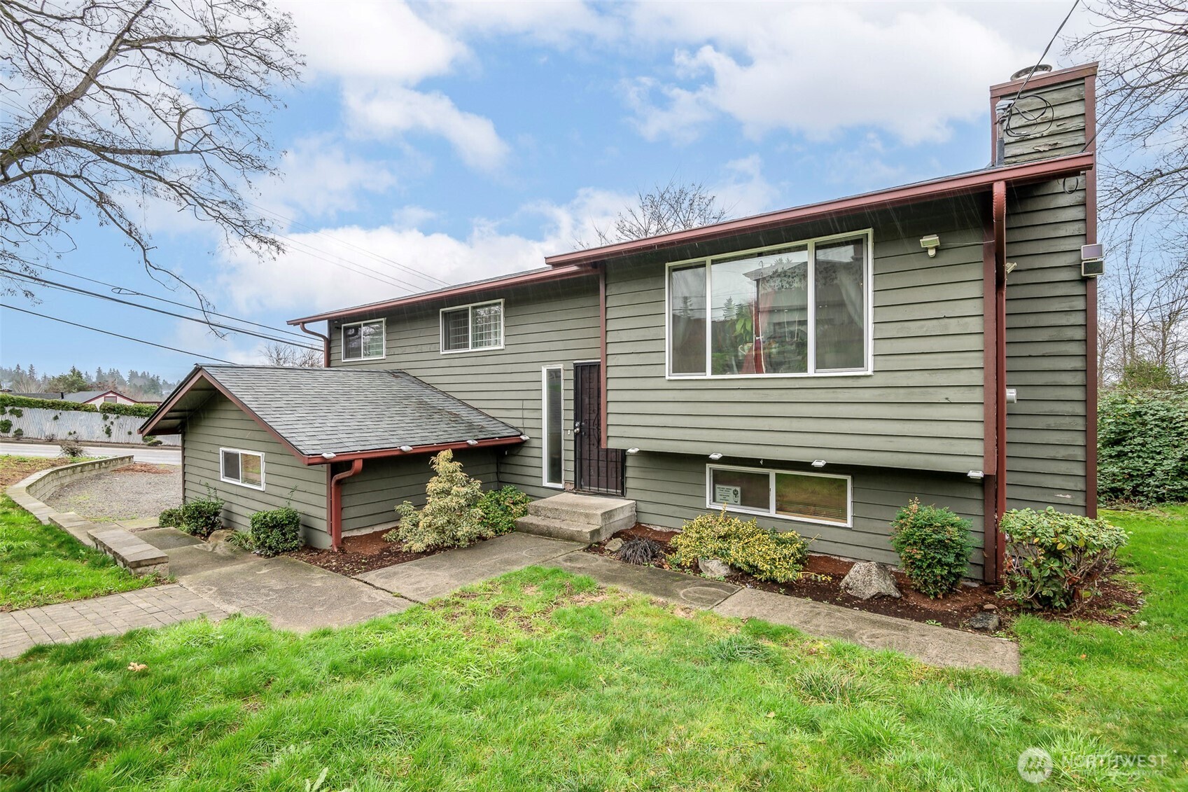 Spacious and well-located, this 4-bedroom, 2.5-bath home offers 2,390 sq ft of comfortable living. The home is move-in ready with investments made by the seller that include a newer roof, newer windows and newer furnace! The functional layout includes multiple living spaces, generous bedrooms, and a flexible lower-level area perfect for guests, recreation, or a home office. Enjoy a bright kitchen with ample cabinetry, plenty of counter space, and a large breakfast bar for casual dining. The cozy living room features a fireplace and oversized windows that bring in natural light. Outside, the yard provides space for gardening or relaxing. Conveniently located near shopping, dining, schools, Kent Station, and commuter routes with quick access to I-5 and SR-167. A great opportunity for buyers seeking size, layout, and long-term potential in an established neighborhood.
