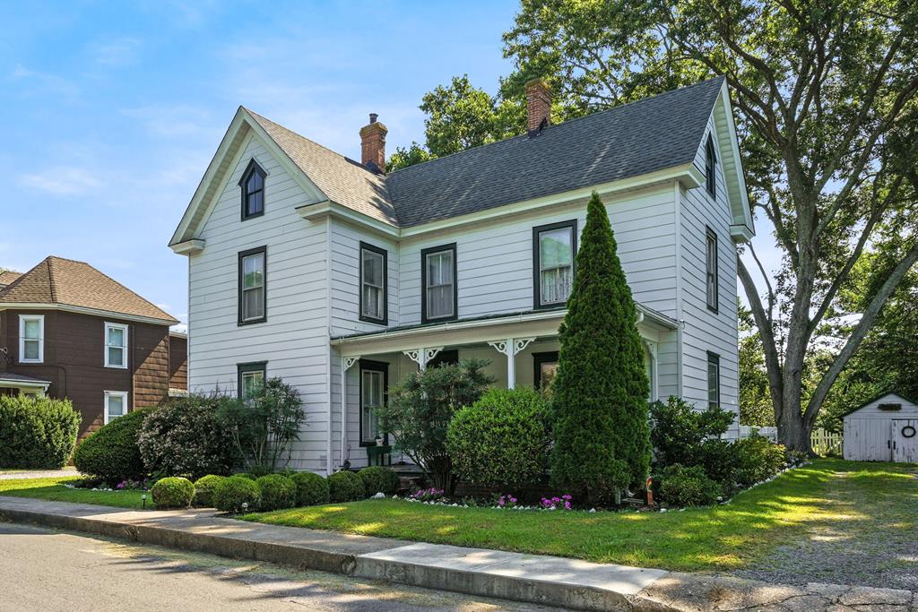 This spacious & modernized 4 bedroom/ 2 bathroom home in the center of Onancock gives off Cool Vibes & Great Energy!  Perfect for retires or a large family. The easy floor plan reflects modern living: w/ a back door leading to the kitchen & a generously sized dining room w/ the living room steps away.  This home even boasts a 1st fl. Bedroom & full bath!  Enjoy living in this historic waterfront town w/ a deep water creek & public marina, shops, galleries & restaurants. The town's cultural amenities include a local playhouse, movie theatre & museum, each hosting public events & concerts regularly. The back yard is immaculately landscaped w/ a section partially fenced for pets.  A charming outdoor shed would be ideal as a place to store your tools or just extra storage. COME SEE!