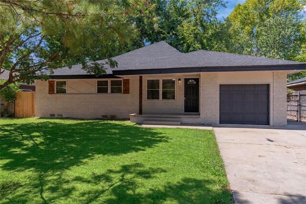 Prime location meets modern comfort in this turn-key 4-bedroom, 2-bathroom complete remodel, perfectly positioned less than 10 minutes from Campus Corner, the University of Oklahoma campus, vibrant local dining, and easy highway access. Discover an inviting open-concept layout filled with bright natural light, fresh interior paint, updated trim, and stylish new flooring throughout. The modern kitchen is designed to impress, featuring sleek quartz countertops, a classic subway tile backsplash, and a convenient breakfast bar that opens directly to the living area, which centers around a warm electric fireplace insert. The main floor houses three generous bedrooms along with two fully renovated, spa-like bathrooms showcasing custom tiled showers with built-in niches, new vanities, and upgraded lighting. Upstairs, an expansive private space offers endless flexibility to function as a fourth bedroom, bonus living room, home office, or media room to suit your lifestyle. Offering high-end updates in an unbeatable Norman location near OU, this move-in-ready home is an exceptional opportunity—reach out today to schedule your private tour!