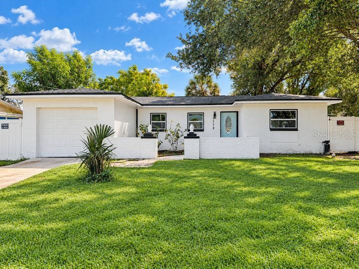 Virtually Staged. Beautifully Renovated and Move-In Ready! This updated 3-bedroom, 2-bathroom home with a 1-car garage offers a wonderful combination of modern finishes, comfortable living spaces, and a convenient Tampa location. Nearly everything has been updated, including a NEW ROOF, NEW AC, NEW WINDOWS, new flooring throughout, and fresh interior and exterior paint!Step inside to discover a bright, inviting interior featuring a beautifully renovated kitchen with granite countertops, white cabinetry, stainless steel appliances, and plenty of space for preparing meals and entertaining. Both bathrooms have been completely remodeled with stylish, modern finishes. The spacious living area provides a comfortable place to relax or gather with friends and family, while the updated flooring and neutral colors create a fresh, welcoming atmosphere throughout the home.One of the home's standout features is the enclosed Florida room, offering additional space to relax, entertain, or simply enjoy views of the backyard. Step outside to discover a spacious, fenced backyard with mature shade trees and plenty of room for outdoor entertaining, grilling, gardening, or creating your own private outdoor retreat. The attached 1-car garage provides additional storage and convenience.Location is another great feature. Situated just minutes from ZooTampa at Lowry Park, this home offers convenient access to Busch Gardens, the University of South Florida, nearby hospitals, shopping, restaurants, and entertainment. Easy access to I-275 makes traveling throughout the Tampa Bay area convenient, including Downtown Tampa, Tampa International Airport, Raymond James Stadium, Amalie Arena, and the area's beautiful Gulf Coast White Sandy Beaches.With so many major updates already completed, this home offers the opportunity to move right in and start enjoying everything Tampa Bay has to offer. Schedule your private showing and come see it for yourself.