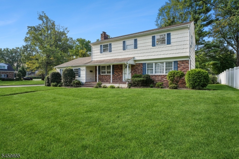 From the moment you arrive, this beautiful Colonial welcomes you with timeless charm and an inviting sense of home in one of Westfield's most coveted neighborhoods. Offering 4 bedrooms, 2.5 baths and an attached 2-car garage, this special home blends classic character with comfortable, functional spaces designed for everyday living and entertaining. The formal living room, filled with natural light and front yard views, flows effortlessly into the formal dining room featuring hardwood floors and chandelier lighting. The oversized eat-in kitchen offers plenty of space to gather along with a warm and welcoming family room anchored by a fireplace and hardwood floors, the perfect place to relax and unwind. A powder room and convenient first-floor laundry/mudroom area add to the ease of daily living. Just beyond, the screened-in porch opens to a fenced backyard, creating a wonderful setting for outdoor dining and entertaining. Upstairs, the primary suite offers a peaceful retreat with an en-suite bath and walk-in closet, along with three additional bedrooms and a full hall bath. The finished lower level provides a spacious recreation room with flexible space to enjoy, plus generous storage and utility areas. Ideally located moments from top-rated schools, vibrant downtown shopping and dining, picturesque parks, houses of worship and NYC transportation. A truly special home in an exceptional Westfield location, where warmth, comfort and convenience come together beautifully.