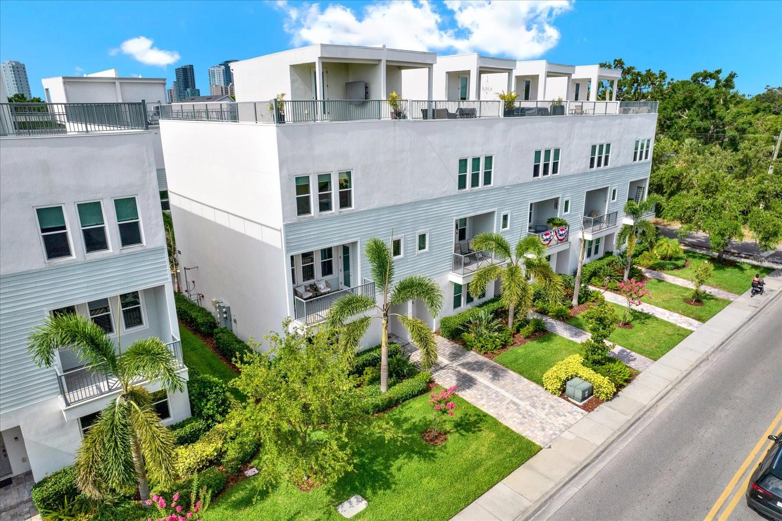 Under contract-accepting backup offers. This stunning end-unit townhome is one of the most desirable in the community, featuring a large private rooftop terraces with sweeping 180-degree views of the Downtown Tampa skyline. Just a short walk to the iconic SOHO District, this luxurious 3-bedroom, 3.5-bath residence offers 2,538 square feet of thoughtfully designed living space, blending high-end finishes with a prime South Tampa location.

Inside, every bedroom is outfitted with custom California Closets, and the layout offers flexibility and privacy across four levels. The first floor includes a mother in-law suite, guest suite or home office with a full bathroom. The second floor features an open-concept living area with a spacious kitchen, dining area and half bath. Upstairs, the third floor offers a generous primary suite and a guest bedroom, both with beautifully appointed en suite bathrooms. The primary suite has his and hers walk in closets and separate vanities. The crown jewel is the expansive rooftop terrace on the fourth floor, offering panoramic views of Tampa Bay and the city skyline.

High-end details include engineered hardwood floors throughout the main living spaces and bedrooms, quartz countertops, rich wood cabinetry, and premium KitchenAid stainless steel appliances—including a gas slide-in range. The oversized two-car garage provides ample storage, and residents enjoy access to the community’s private pool.

Perfectly positioned near South Tampa’s best restaurants, boutiques, and nightlife, and just minutes to Downtown, Hyde Park, and Bayshore Boulevard, this home offers elevated city living in one of Tampa’s most walkable and vibrant neighborhoods.