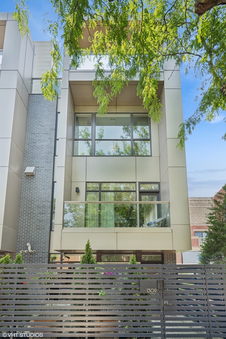 Nothing like this stunning and large corner home, in one of Lincoln Park's highly desirable locations. Bathed in natural light, this contemporary yet comfortable 4-level row home, from one of Chicago's most sought-after designers and builders, has been professionally custom designed with the highest end finishes too numerous to list here but include a stunning, one-of-a-kind floating staircase, private elevator, high ceilings, two living rooms, silenced electronic blinds throughout and a primary suite with truly must-see dream closets. Featuring multiple outdoor spaces + magazine quality rooftop with breathtaking skyline views and its own outdoor kitchen, this home also includes a private attached 3 car heated garage accessed behind a secure gate system. All this, conveniently located close to great restaurants, shops, theaters and main transportation hubs.