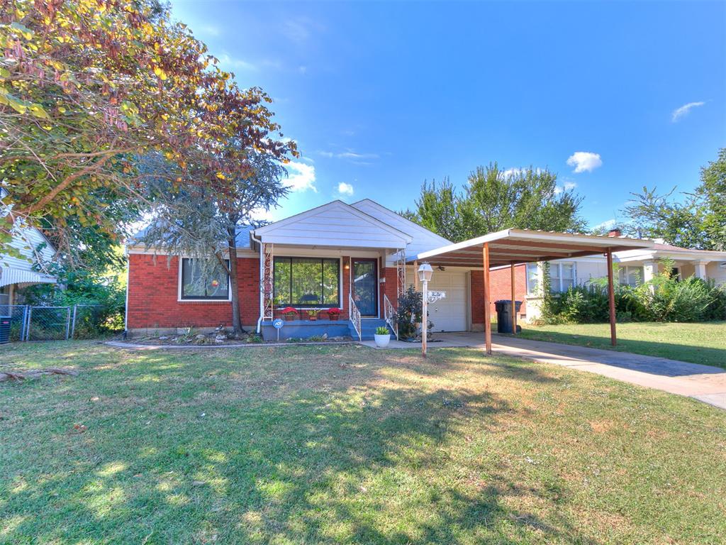 Lots of updates on this cutie! Featuring a vastly open and fully functional floor plan offering 2 bed, 1 bath, carport, and a large 1 car garage. Pride of ownership is shown in this move-in-ready home with hardwood floors and ceramic tile throughout. The inviting living room is spacious with built-in shelves. Enjoy the kitchen with lots of storage, pantry, and eating area. Retire to the master bedroom with a ceiling fan and lots of natural light. 1 additional bedroom and full bath give you lots of space. Relax outside on the 10X14 deck overlooking the fully fenced backyard with a newly redone 300sqft storage building and picturesque landscaping. Located in a quiet neighborhood close to a park this is one to see!