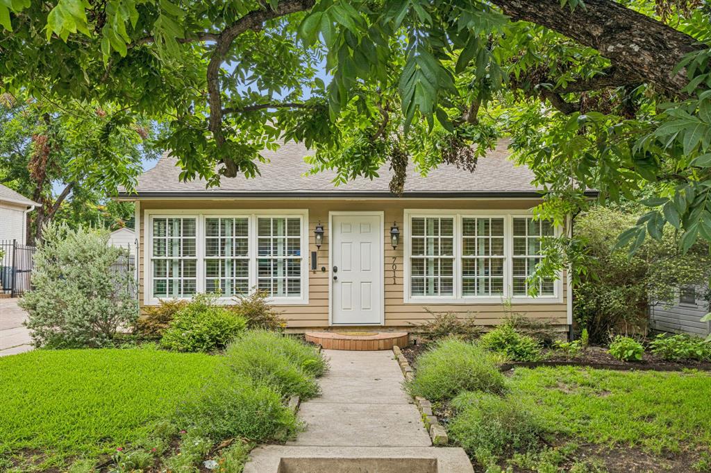 Charming 1940s Neo-Classical home in the heart of Hollywood Santa Monica! Designated by the Hollywood Santa Monica Historical Conservation District, this single-family gem offers timeless character paired with everyday comfort.

Inside, arched doorways and original hardwood floors create a warm, inviting flow. The spacious family room, anchored by a wood-burning fireplace with its original 1940s mantle and hand-painted tile, opens seamlessly to the dining room and kitchen. The enclosed, air-conditioned sunroom offers flexible space with views of the vibrant neighborhood—ideal as a home office, playroom, or cozy reading nook.

Step outside to discover an amazing backyard retreat. A large deck is perfect for summer barbecues, while the oversized yard—complete with towering trees and an 8-foot privacy fence—offers room for a pool, garden, or even home expansion. A detached 2-car garage and a quaint, powered storage shed add function to the charm.  City approved architecture plans, available by request, to add a 2nd level primary suite and 1st level remodel-renovation, to maximize the beauty of the home.

Nestled just steps from Lindsley Park and zoned to highly acclaimed Lakewood Elementary, this home places you in one of East Dallas’ most sought-after neighborhoods. Hollywood Santa Monica is celebrated for its historic beauty, active community events, and unbeatable location—minutes to White Rock Lake, the Arboretum, Lakewood Country Club, and downtown Dallas.

This delightful home blends history, flexibility, and neighborhood spirit—ready to welcome you home.