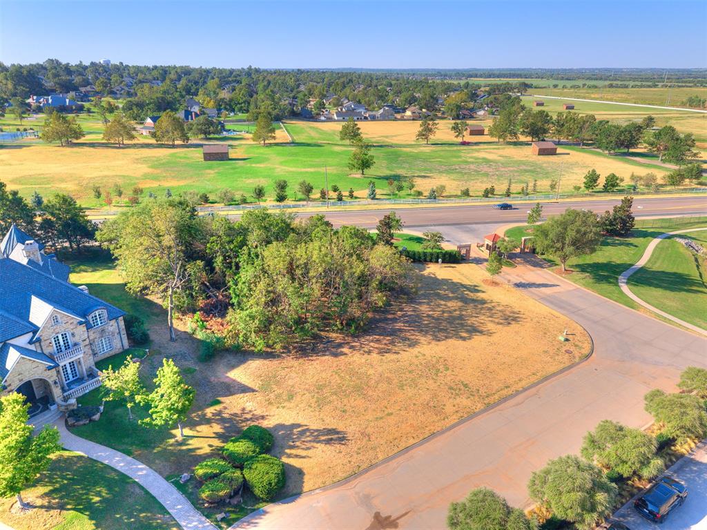 A rare opportunity to build in Ashton Grove, one of Norman’s most prestigious and architecturally distinguished communities. This exceptional water-view homesite offers the perfect setting to create a custom residence surrounded by timeless architecture, meticulous landscaping, and the refined beauty that defines Ashton Grove. Bring your vision to life with one of the community’s approved builders and design a home thoughtfully tailored to your lifestyle. With tranquil water views and an established neighborhood known for its impressive custom estates and beautifully maintained surroundings, this property offers an increasingly rare opportunity to build new within one of Norman’s most coveted addresses. Ideally positioned just minutes from I-35, premier shopping and dining, the University of Oklahoma, and everything Norman has to offer, Ashton Grove provides a remarkable combination of privacy, prestige, and convenience. Exceptional homes begin with exceptional locations. This is your opportunity to create something truly special in Ashton Grove.