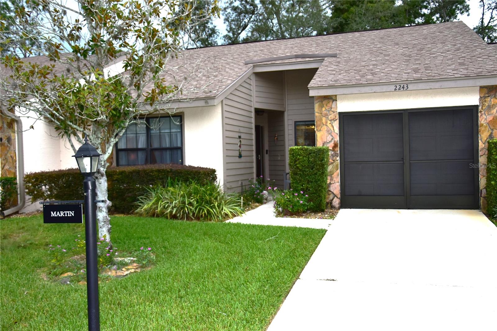 Welcome to this beautifully cared-for 2-bedroom, 2-bath villa with one car garage, in Timber Pines, where comfort meets peace of mind. This home features an easy-flow layout, a step saver kitchen with a new refrigerator and dishwasher, and a serene screened lanai perfect for enjoying Florida mornings. The primary suite offers a private retreat, while the second bedroom is ideal for guests or hobbies. Major updates add exceptional value, including a updated electric panel, new hot water heater, and a 2022 roof, giving you confidence and low-maintenance living from day one. Located in Timber Pines, one of the area's premier 55+ pet friendly, gated communities. You'll enjoy multiple golf courses, pools, pickleball, a fitness center, clubs, and endless activities. This villa is ready for you to move in and start living the lifestyle you've been dreaming of.