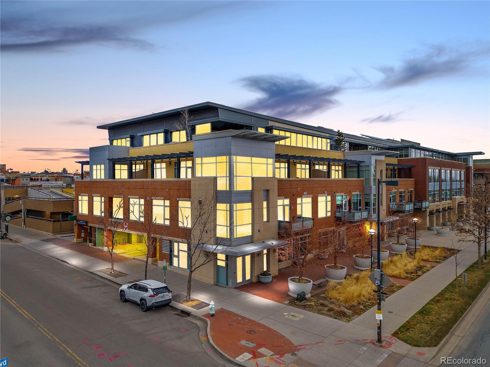 Boulder living at its finest. This second-floor residence offers stunning Flatiron mountain views, walls of natural light, and a fully remodeled interior — all in the heart of downtown.The open-concept layout features smart automated shades, hardwood floors, and fresh paint throughout. The Palencia-style kitchen is appointed with sleek black cabinetry, white and beige quartzite countertops, a large island, and premium appliances including a Wolf range and Sub-Zero refrigerator.The primary suite sits just off the kitchen with frosted glass windows, a completely remodeled five-piece bath, a large walk-in closet, and in-unit laundry. The second bedroom features a Murphy bed that converts from lounge sofa to guest bed, alongside a fully remodeled hall bath with enclosed shower.Step outside to a private balcony with mountain views — perfect for grilling and Colorado evenings. The building includes two private parking spots, a large storage unit, 24/7 security, and elevator access.Steps from Pearl Street dining and shopping, the Boulder Farmers Market, world-class hiking, CU Boulder, and the city's newest distinction as host of the Sundance Film Festival beginning January 2027.Don't miss this one.
