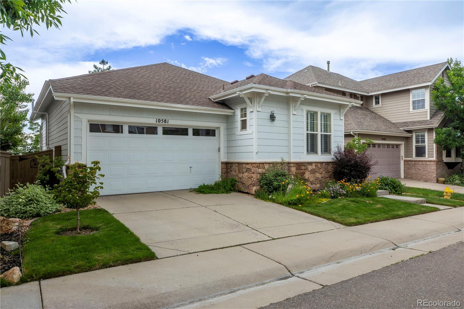 Welcome to this light, bright, and airy ranch-style home in the highly desirable Firelight subdivision of Highlands Ranch. Ideally located near miles of scenic hiking and biking trails, this beautifully designed home offers an open and functional layout with elegant upgrades throughout.

The spacious living and dining areas showcase rich bamboo flooring and a striking 3-sided gas fireplace—perfect for cozy evenings and entertaining. Large windows fill the home with natural light, while plantation shutters offer both privacy and timeless charm.

Working from home? The main floor study provides a quiet, dedicated space ideal for remote work or a reading nook.

Retreat to the luxurious primary suite featuring a generous walk-in closet and a stunning en-suite bathroom with high-end finishes. The main floor also includes a conveniently located laundry room, adding to the home's overall functionality.

The finished basement offers a large recreation room, a private bedroom and bathroom, and plenty of storage. An expansive unfinished section offers exciting potential—easily transform it into a 4th (non-conforming) bedroom, home theater, gym, or craft space.

Step onto the large deck in back and enjoy breathtaking views of the mountains and downtown Denver—an everyday reminder of why Colorado living is so special! 

Low maintenance back yard and great south facing exposure out front. Set up your showing today. Don't miss your chance to call this property home. It has been priced below market for quick sale and possession.