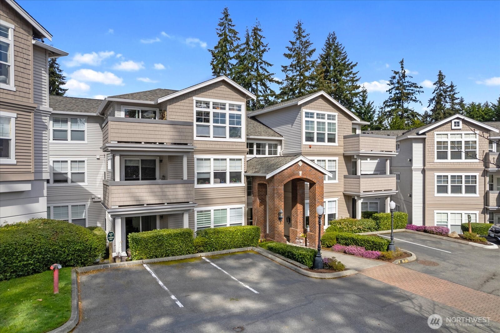 Welcome to Montclair, a beautiful, gated community close to everything that Edmonds has to offer. This extra-large one bedroom, one 1/2 bath condo is easily accessible with two secure parking spots (one right next to the elevator), and wide doorways. Open main floorplan with dining area, living room and kitchen. Large patio that backs to trees, creating an in-city oasis. The primary suite includes a walk-in closet and ensuite bathroom. Extra storage outside your front door. Great location, close to shopping, restaurants, and transportation.