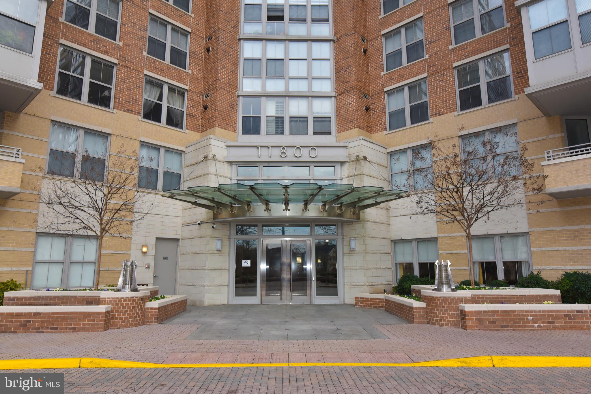 Location Location and more. Not only is this lovely condo  incredibly convenient to metro and Reston Town Center It overlooks the W and OD trail, trees, and a beautiful fountain.  Have your morning coffee on the balcony and enjoy the view! This place is move in ready, or ready to lease.The unit has a new refrigerator,  washer and dryer in he unit and a new hot water heater.Amenities include business center, billiards room, theatre, Gym with 24 hour access, community room for your special events  and rooftop pool. Theres even a snack room with vending!under 3/4 of  mile from Metro with paved access to the Trail that takes you across to Town Center without crossing Reston Parkway.  Don't miss this turnkey  2 bedroom .