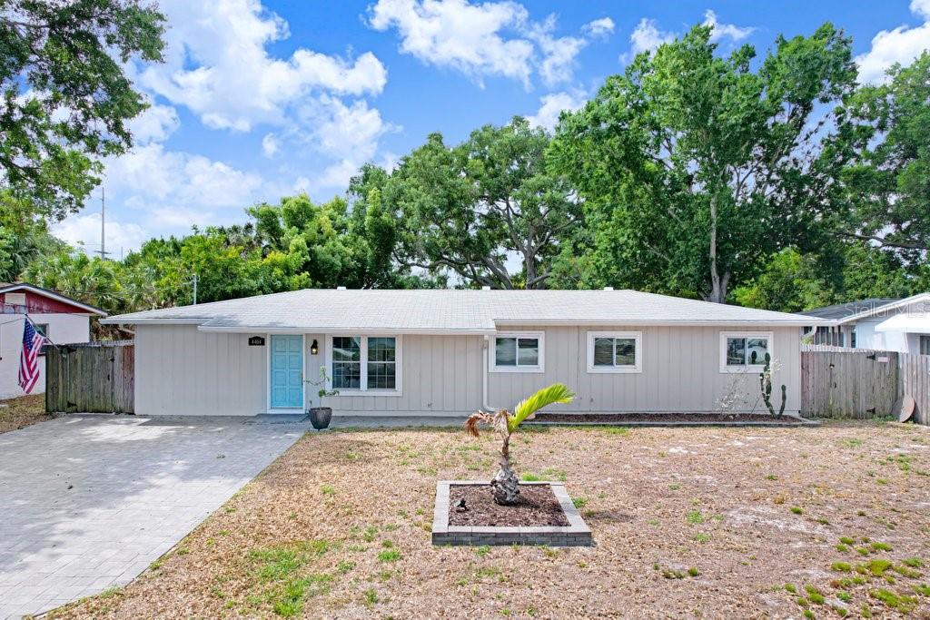 Welcome to your South Tampa oasis—an exceptional pool home offering the perfect blend of style, comfort, and convenience, all under $600,000. This beautifully maintained 4-bedroom, 2-bath residence features a highly desirable open great room floorplan, ideal for both everyday living and entertaining. The heart of the home is a stunning, thoughtfully designed kitchen complete with white shaker cabinetry, elegant glass display cabinets, solid stone countertops, a floor-to-ceiling pantry, and a spacious island. Stainless steel appliances, a classic white subway tile backsplash, and stylish pendant lighting complete the space, making it as functional as it is beautiful. Engineered hardwood flooring flows throughout the home, enhancing its warmth and modern appeal. A generously sized laundry room adds convenience, and yes—washer and dryer are included. Step outside to your private backyard retreat, designed for low-maintenance living with a fully fenced yard and turf lawn. The showstopper is the gorgeous heated, saltwater pool (2021) featuring a sun shelf, surrounded by travertine pavers and an expanded covered patio, patio lights, —perfect for grilling, relaxing, and entertaining year-round. Major updates provide peace of mind, including Roof (2021), HVAC (2021), Pool Pump (2021), and Pool Heater (2021). Several windows were replaced in 2017. The home experienced no damage or flooding during the 2024 storms, and current flood insurance is just $800/year. Additional highlights include a large storage shed and ample parking. Ideally located near Robinson High School, home to the sought-after International Baccalaureate Program, and just minutes from the Crosstown Expressway—offering easy access to downtown Tampa and St. Petersburg as well as MacDill AFB. This move-in-ready home truly checks all the boxes—schedule your showing today! No homeowner Association fees.