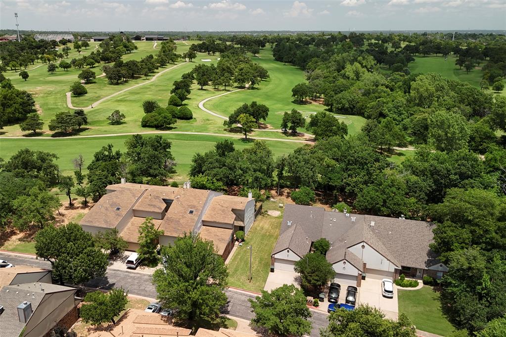 Looking to build a townhouse in the Edmond school district with golf course views? Look no further than this centrally located lot in the Woodcreek addition. Close proximity to shopping, restaurants, entertainment, and golf course with tennis and pickle ball courts. HOA $71/mo includes pool access and mowing