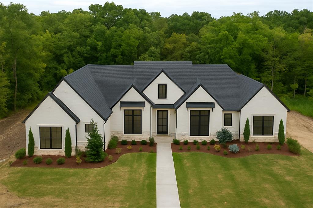 SINGLE STORY LUXURY BRICK & STONE HOME on a WOODED 1.4 ACRE LOT in North Edmond! 

Welcome to Lost Creek — Edmond’s newest luxury addition tucked just East of coveted Cascata Falls. This exclusive phase offers expansive 1+ acre homesites that back directly to a natural creek and mature trees, providing unmatched privacy and a serene backdrop for your custom home.

This exquisite single-story residence combines timeless design with modern functionality. The exterior showcases elevated architectural lines, designer-selected finishes, and expansive glass openings that frame the wooded landscape. Every inch of this home is thoughtfully crafted to capture the luxury lifestyle Edmond is known for.

Home is built with 2x6 construction, spray foam insulation, EV Charger, post-tension foundation.

Inside, you’ll find:

True 4 Bedrooms + Study (12’ x 13’) + Game Room (18’2” x 16’3”)
Dedicated Dining Area
3-Car Garage (24’ deep) perfect for oversized vehicles or storage needs
Butler's Pantry
His & Her Closets in Primary

The open-concept living and kitchen area centers around a statement fireplace and chef’s kitchen with premium appliances, custom cabinetry, and designer lighting selections that define modern luxury.

Home is under construction with an anticipated completion date of April 15, 2026 and will be featured as the 2026 Spring Parade Home. Take advantage of early bird pricing now — with a $10,000 builder incentive toward contract in 2025!

Lost Creek is shop-approved (per HOA standards) and allows for a Casita or Pool House, offering flexibility for multi-generational living or an at-home retreat.

Utilities: OGE, ONG, Cox or AT&T High-Speed Internet
Taxes: Not yet assessed

Secluded. Sophisticated. Stunningly designed. This is your opportunity to own a one-of-a-kind modern estate in one of Edmond’s most anticipated new communities.

Inquire today to make your personal design selections and customize your finishes before completion!