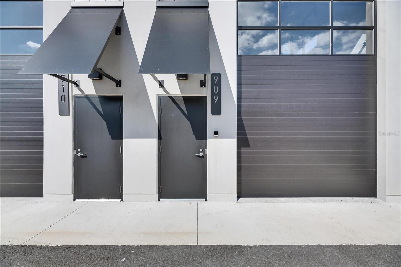 Elevate your ventures with this prime corner commercial garage condo situated within the Motor Enclave, a premier motorsports community. The Motor Enclave is the largest garage community located in Tampa. This 779 sq. ft. corner unit offers a blend of open and adaptable space, perfect for storage, workshops, office or automotive businesses. Plans for a build out included. This unit is a blank canvas that allows for free-standing structures, giving you the freedom to design your space without anchoring to the walls. Gated community with 24/7 security, ensuring the safety of your valuable assets. Easy access to major highways I-75 and I-4. With a Membership to the Motorsports club, garage owners have access to community amenities including a 1.72-mile track designed by Hermann Tilke, a 100-acre off road experience, a 2-acre skid pad, and a resort style pool. Located within the community is a 37,000 sq. ft. event center perfect for gatherings, networking, and attending public and private events. This garage condo is an exceptional opportunity to be part of an exciting motorsports community. This IS NOT a residential property. Whether you're looking to expand your automotive business or create a personal workshop, this corner unit offers the perfect blend of space and flexibility.