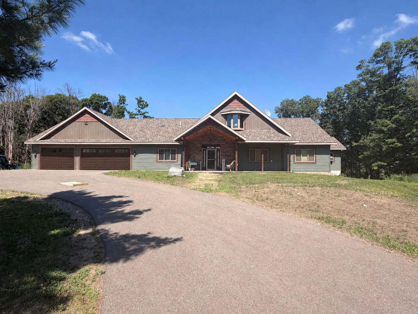 Ready for finishing touches/ sold as is/ 3 Bedrooms/ 2 Baths Located on Private 6.45 acres Walk out lower level ICF built home strong and very well insulated/ Stone Fireplace, Upper level loft/ spacious entry open floor plan/ walkout lower level with some framing and another bath / Extra large 3 car garage with drains and insulated garage ready for heat. Looking for greatest and best offer. Can do contract for deed with 10% percent down. Appraised for $700,000.00 in 2022.