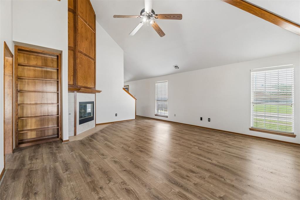 Say hello to the corner-lot cutie you've been waiting for! Packed with charm and full of character, this move-in ready home features fresh paint, beautiful landscaping, a welcoming front porch, a two-car garage, and a spacious fenced side yard.Step inside to soaring ceilings, a cozy gas fireplace, and a unique kitchen that's anything but cookie-cutter. The flexible split floor plan offers a spacious secondary bedroom and full bath downstairs, while the private primary suite is your own retreat with an ensuite, private patio, and separate entrance. Upstairs, the oversized flex space with a half bath is perfect as a third bedroom, home office, game room, or guest suite.Conveniently located in a prime location near parks, schools, shopping, dining, and major highways, this home offers the perfect blend of character, versatility, and everyday convenience. If you've been looking for a home that stands out from the rest, this one is a must-see! Seller to verify all information.