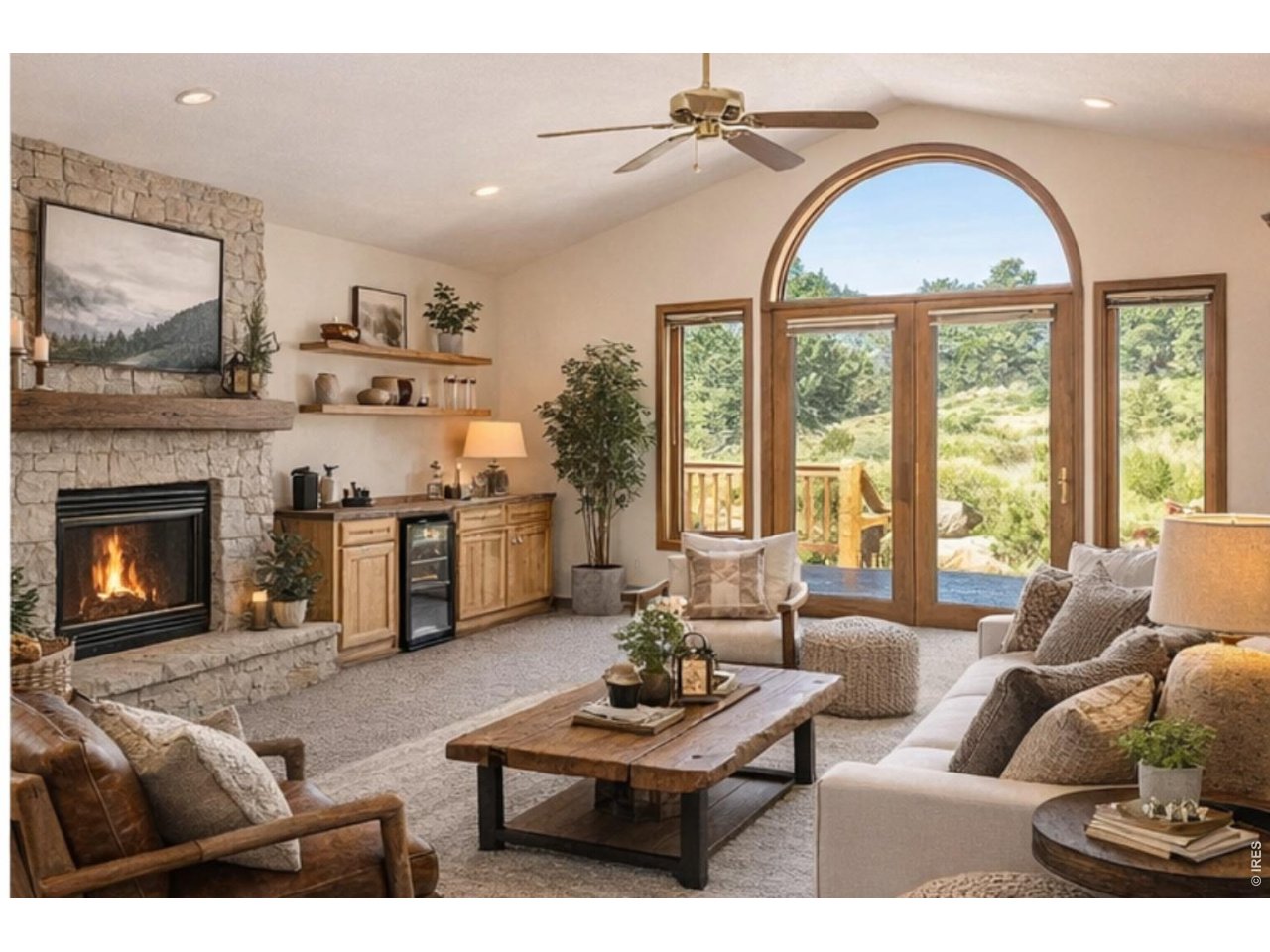 RARE DETACHED ONE-LEVEL LIVING NO STAIRS 2-CAR GARAGE MOVE-IN READY LOW-MAINTENANCE ESTES PARK LIVING and VIEWS Welcome to easy Estes Park living in this detached, all-one-level condo with no stairs, no shared walls, and an oversized 2-car garage. Enjoy the privacy and feel of a single-family home with the convenience of low-maintenance condo living. Beautifully maintained and truly move-in ready, the home features a new roof, brand-new carpet, refinished hardwood floors, and fresh interior and exterior paint. The spacious living room offers a cozy fireplace and built-in wet bar and opens to a private, freshly stained deck, perfect for relaxing or entertaining while enjoying the peaceful surroundings. The kitchen features a charming breakfast nook and flows into a light-filled dining area with plenty of room for everyday meals or gatherings. Generous storage adds even more convenience. Whether you're looking for a year-round residence or an Estes Park second home, this property offers one-level living, no shared walls, a 2-car garage, and a peaceful mountain setting.