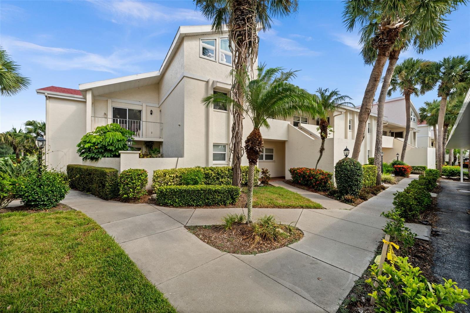 This spacious 2-bedroom, 2-bath first-floor end unit condo offers 1,607 square feet under air and stunning views of the 9th tee of the golf course! The interior features fresh paint, kitchen with stainless steel appliances as well as an in-unit washer and dryer included in the price. A gas fireplace fueled by propane adds warmth and charm, while the generous layout provides both comfort and functionality.
Additional highlights include accordion shutters, a designated outdoor storage closet and a carport space conveniently located second from the left in front of the building. The unit also includes a small courtyard-style common area at the entrance and is offered partially furnished if desired by the buyer. The A/C was replaced in 2019 and the water heater in 2017.
The well-maintained community offers a variety of amenities, including two pools, a clubhouse and ample parking. HOA fees cover water, sewer, high-speed internet, cable, trash, monthly pest control, exterior maintenance and flood insurance—making for easy, low-maintenance living.
Ideally located just across from Publix and Circle K Plaza, with convenient access to Venice downtown, Sarasota, Wellen Park and local airports. This home combines comfort, convenience and beautiful golf course views—an excellent opportunity for full-time or seasonal Florida living.