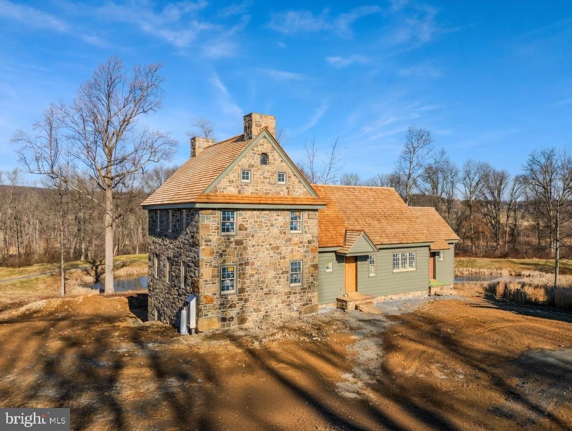 BUY EARLY AND MAKE IT YOUR OWN. This fully custom home at Olde Bulltown Village will be under construction as a model home, but you have the opportunity to buy this lot and design prior to that and own every detail. Talk to us about your timing and walk the lot in person. Tucked on the Northern side of the community with a buffered overlook of the private French Creek Golf Club and a wooded backdrop, this home offers a daily retreat of seclusion and beauty. Not familiar with Olde Bulltown Village? Chester County’s luxury custom home community offers authentic 18th century architecture using the finest building materials combined with 21st century amenities. The exterior of the homes displays architectural detail according to community guidelines, ensuring the integrity of the homes. The interior of the homes is yours to personalize every detail and selection. Surrounded by French Creek Golf Club and preserved farmland, this pristine community offers the best of Chester County’s natural beauty and the best home quality for the most discerning buyers. French Creek Golf Club is a private club and the course is designed by renowned architect Gil Hanse. Call us for information on this quick-delivery home, or to see other available lots.This home is DECKED OUT with the finest exterior and interior finishes and materials!EXTERIOR INCLUSIONS:-Reproduction beaded & beveled painted wood siding over ¾” lath-Locally sourced Chester County fieldstone laid in an 6” veneer over rain screen-Cedar shingle roof installed over cedar breather-Marvin Ultimate aluminum-clad exterior windows and porch door-Cedar shutters with reproduction hardware-Bevolo copper light fixtures-Full color natural cleft bluestone stoops-Handmade oversized brick walkways-Reproduction beadboard porch ceiling-Thermally treated wood railing with individual cutouts.INTERIOR INCLUSIONS:-Hardwood floors-Carpeted basement and secondary bedrooms-Tile in bathrooms-Real brick tile in mudroom-Walk-in tile shower in master-Custom cabinetry-Soapstone countertops-Stainless steel appliances-Custom lighting-Beadboard ceiling over kitchen and dining room-Gas fireplace with raised panel surround-6-panel raised panel wood doors-Emtek hardware-Highly efficient geothermal heating & cooling-Custom shelving in master closet -Custom shelving and beadboard in mudroom
