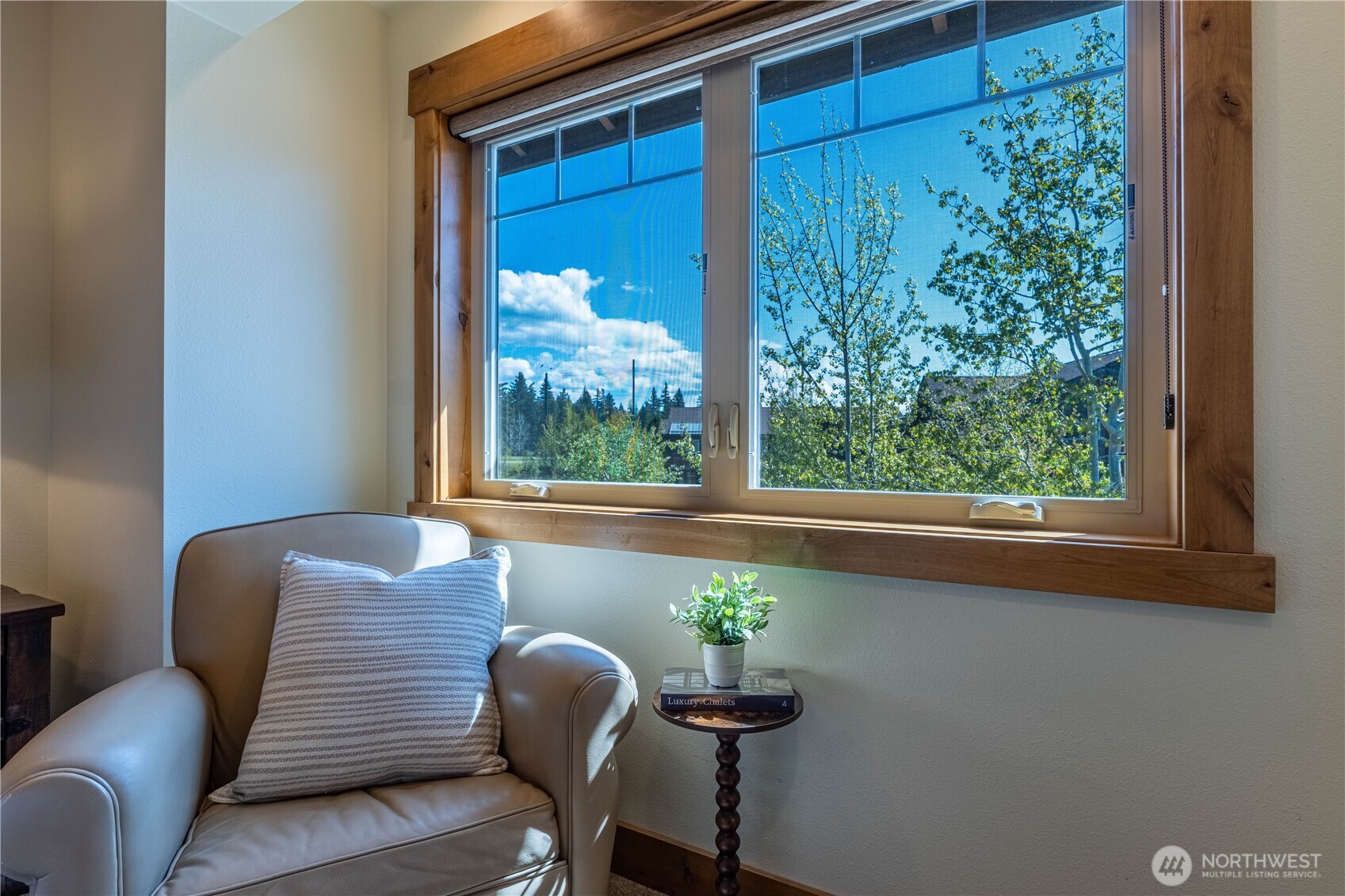 Spacious third king bedroom featuring a cozy sitting area—perfect for unwinding with a book