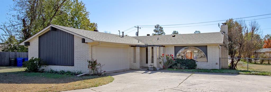 Welcome to 1534 Ashley Cir in Norman.  Built in 1973, this home is nestled into a quiet cul-de-sac and welcomes you with its Mediterranean-style courtyard. The 1573 sqft single-family home has 3 bedrooms and 2 bathrooms. The primary bedroom and ensuite create a getaway complete with a private door connection out to a spacious covered patio.  The efficient kitchen, in its original design places everything at your fingertips. A serving counter and passthrough to the dining area which is surrounded by windows overlooking the backyard, enhance the home's connectivity.  Gather around the gas fireplace in the living room that features high ceilings with wooden beam detail. The unique arched front window floods the room with natural light.  Additional highlights include, an extra-wide driveway, two car garage with built in storage, work bench, plus a large storage shed in the backyard. This Norman residence is brimming with potential and waiting to be transformed with your personal touches!